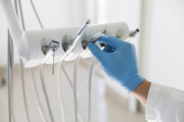 Professional Emergency Dentist technician working in Raintree Plantation, MO